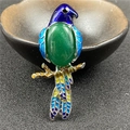 Exquisite parrot brooch with green oval gemstone and blue enamel wings design - Green Aventurine