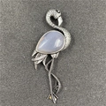 Vintage silver flamingo brooch with teardrop light blue gemstone and feather texture - Grey Agate Style