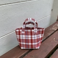 Red and white checkered woven tote bag with durable handles for daily commuting - Red
