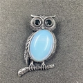 Broche hibou vintage avec opale bleu clair ovale et finition en argent antique - Opale Synthétique