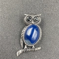 Vintage silver owl brooch with a large oval dark blue stone and black rhinestone eyes - Blue Agate