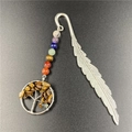 Detail of silver feather bookmark with seven chakra stones and tree of life charm - Tiger's Eye