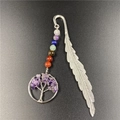 Detailed view of silver feather bookmark with chakra beads and Tree of Life pendant - Amethyst