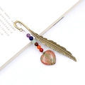 Antique bronze feather bookmark with seven chakra beads and heart-shaped unakite stone - Unakite