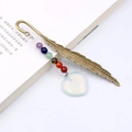 Vintage metal feather bookmark with colorful beads and a white heart pendant charm - Opal