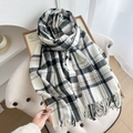 Classic British brown plaid scarf with thick fringe edge on a wooden display tray - Grey/White