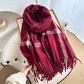 Thick red and white checkered scarf with fringe detail on a vintage wooden frame - Burgundy