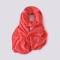 Lightweight coral red linen scarf with fine fringe edges in a folded ring layout - Orange Red