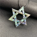 Macro shot of abalone shell hexagram pendant featuring iridescent mosaic textures - Natural Abalone Shell Texture Style (No. 4)