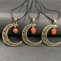 Three antique bronze crescent moon pendants with raw carnelian stones on black cords - 1Pc Rainbow Stone