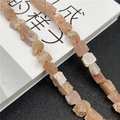 Macro shot of irregular natural orange sunstone raw mineral beads for DIY jewelry making - 1 Strand Sunstone