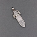 Pink quartz hexagonal bullet pendant with polished silver metal bail on grey background - Rose Quartz