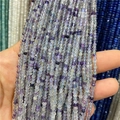 Macro shot of 2x3mm faceted amazonite abacus beads in cool toned gradient colors - Fluorite 1 Strand