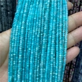 Close-up of 2-3mm faceted amazonite beads string for jewelry making in natural light - 1 Strand Amazonite
