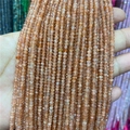 Macro detail of 2-3mm faceted orange sunstone abacus beads for jewelry making - Golden Strawberry Quartz 1 Strand