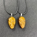 Tiger's eye gemstone skull pendant necklace with dark yellow and brown stripes - Tiger's Eye