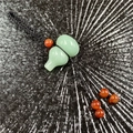 Handcrafted light green jade gourd pendant on black woven cord with carnelian beads - Green Aventurine