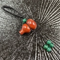 Red agate gourd pendant keychain featuring elegant black woven rope and green bead accents - Rainbow Stone