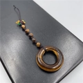 Tiger Eye stone safety button pendant with brown braided rope and beaded details - Tiger's Eye