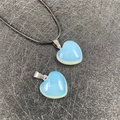 Heart-shaped opal stone pendant with black woven rope necklace and silver metal clasp - Synthetic Opal