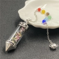 Rainbow crystal pendulum necklace with silver chakra beads and engraved heart details - Colorful