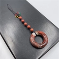 Red jasper doughnut pendant with traditional knot and five matching gemstone beads - Rainbow Stone