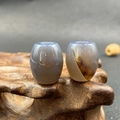 Polished grey-blue and brown banded agate barrel beads on a wood stand - 1 Piece / Grey Agate