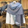 Blue and grey plaid oversized tassel scarf paired with a beige wool winter coat - Blue & Black Plaid