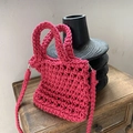 Handcrafted fuchsia woven crochet bag with chunky texture and long shoulder strap - Rose Red