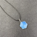 Light blue flower star pendant necklace with black braided cord and silver metal clasp - Synthetic Opal