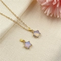 Gold-plated star pendant necklace featuring translucent white opal stone and fine chain - Synthetic Opal