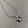 Obsidian hexagram star pendant necklace with black cord chain and silver bail detail - Obsidian
