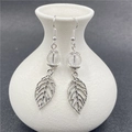 Silver leaf earrings with clear crystal beads and hollow metal leaf pendants - White Crystal