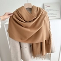 Classic camel cashmere-feel scarf with fringe layered on a grey wool coat for winter - No.11 Khaki