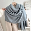 Dusty blue fringe scarf in soft cashmere-like knit paired with a beige wool coat - No.7 Dark Gray