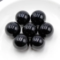Polished 16mm natural black agate stone beads set on white ceramic tray - Black Agate