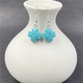 Silver hook earrings featuring turquoise-colored cross pendants with marble texture - Synthetic Blue Turquoise