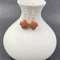 Cross earrings featuring reddish-brown sandstone charms on silver hooks for women - Synthetic Goldstone
