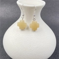 Cross-shaped natural stone earrings in pale yellow finish with silver hooks - Topaz