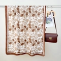 Sciarpa in cotone e lino nei toni della terra con motivi floreali di rose e forme geometriche - 85x180cm / Marrone