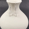 Silver drop earrings featuring faceted clear quartz clover pendants on a ceramic vase - White Crystal 1 Pair (Optimized)