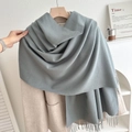 Solid color light blue-grey fringed tassel scarf styled over an elegant wool coat - No.8 Medium Gray Blue