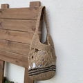 Khaki hand-woven straw tote bag with crochet floral patterns and black striped accents - Khaki