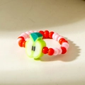 Detail of colorful fruit beaded ring with a cute green apple charm on elastic cord - Green Apple Style (31025-ring-pr)