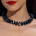 Detail of marble pattern acrylic beads necklace showing glossy resin texture on skin - Black White Marble(31101)