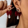 Close-up of red velvet bow earrings with teardrop pearls and vintage gold accents - Artificial Pearl Ring Red Bow Teardrop Pearl Style (31412-ear-red)