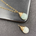 Handmade wire-wrapped green aventurine teardrop pendant necklace in golden finish - Amazonite