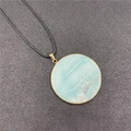 Minimalist round light blue natural stone pendant with gold edge on black cord necklace - Amazonite