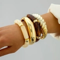 Stack of gold spiral geometric bracelets with cream and amber resin textures - Creamy/Amber/Gold Vintage 4-Piece Set (31653)