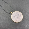 Natural round rose quartz pendant necklace with gold metal edging and black wax cord - Rose Quartz